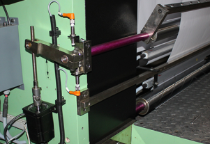 Automatic Decurling System